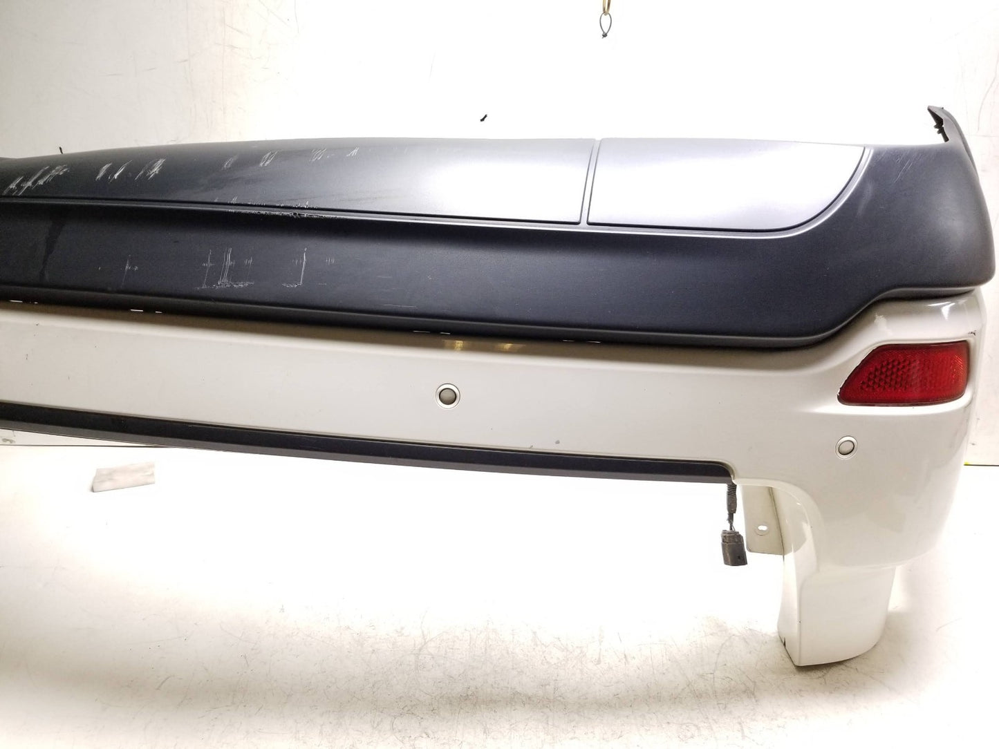 2011 - 2015 Jeep Grand Cherokee Rear Bumper Cover OEM