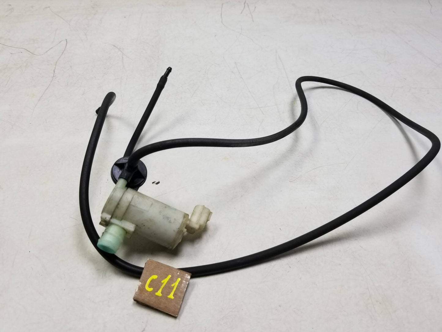 2008 - 2015 Nissan Rogue Windshield Washer Fluid Reservoir Pump  OEM
