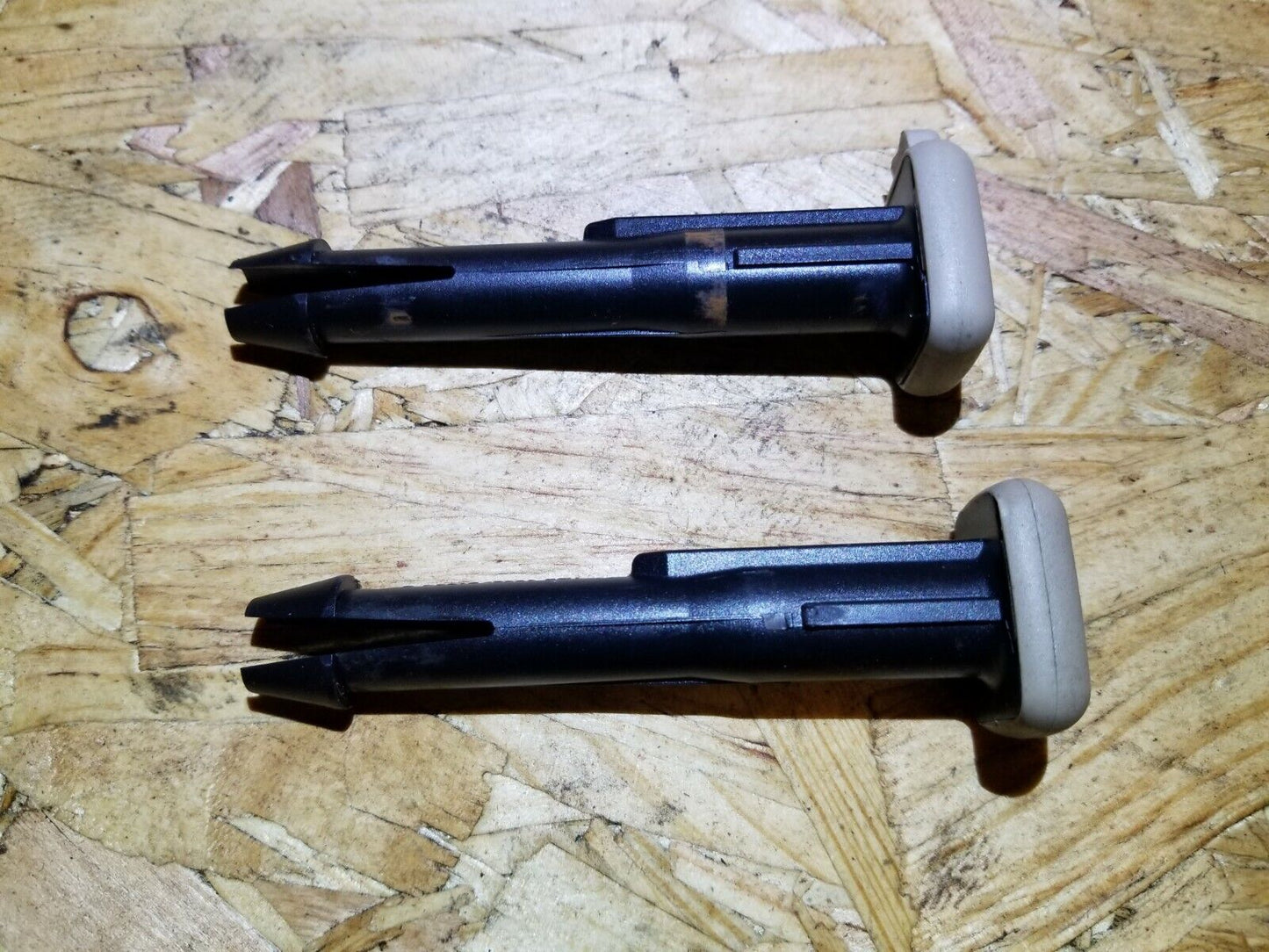 2004 - 2009 Cadillac SRX Front Seat Headrest Sleeve Holder 2pcs OEM