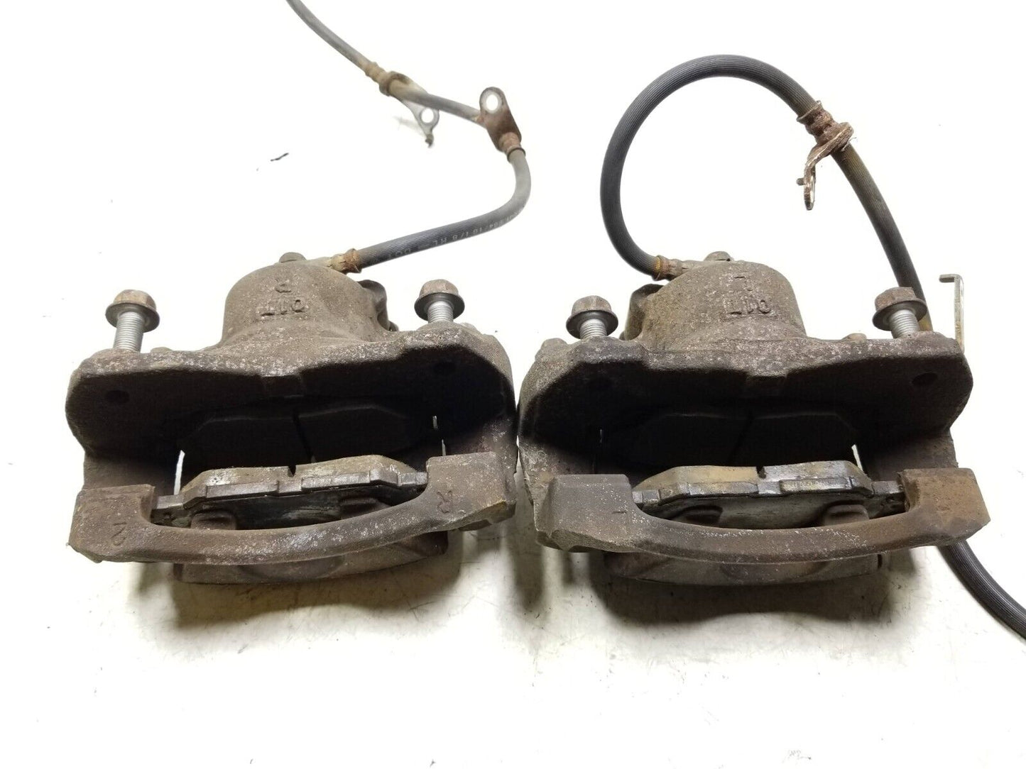 08 - 15 Scion Xb Brake Caliper Front Driver & Passenger Side Pair OEM