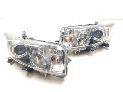 08 - 15 Scion Xb Headlight Driver Passenger Side Pair OEM