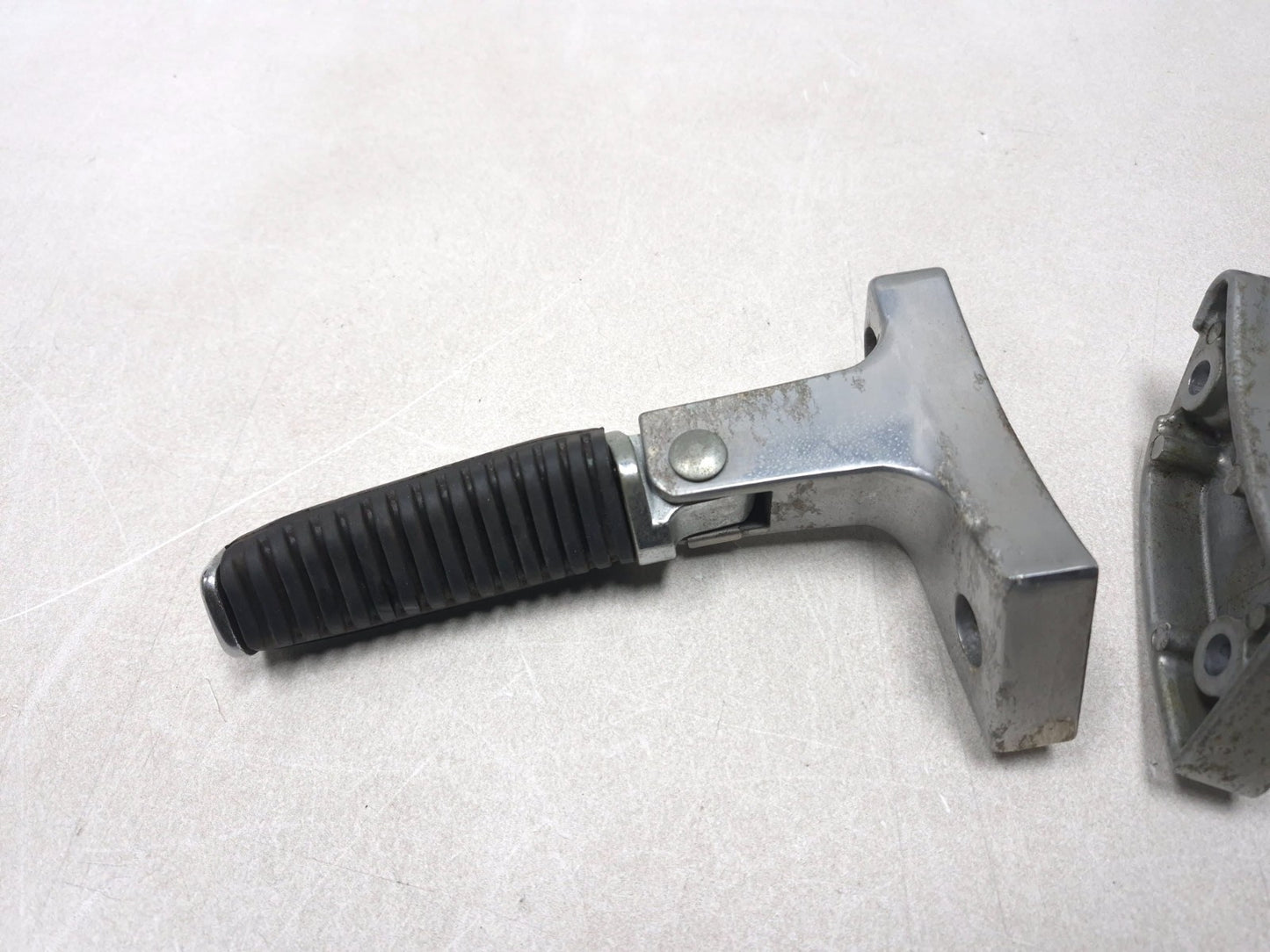 1999 Suzuki Intruder 1500 Rear Passenger Footpeg Set OEM