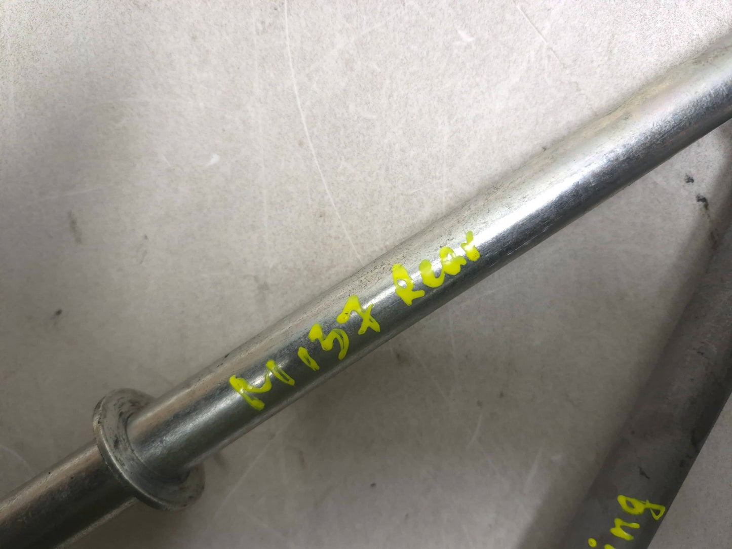 2025 Kawasaki Ninja Ex 500 Rear Wheel Axle & Swingarm Bolt Pair OEM