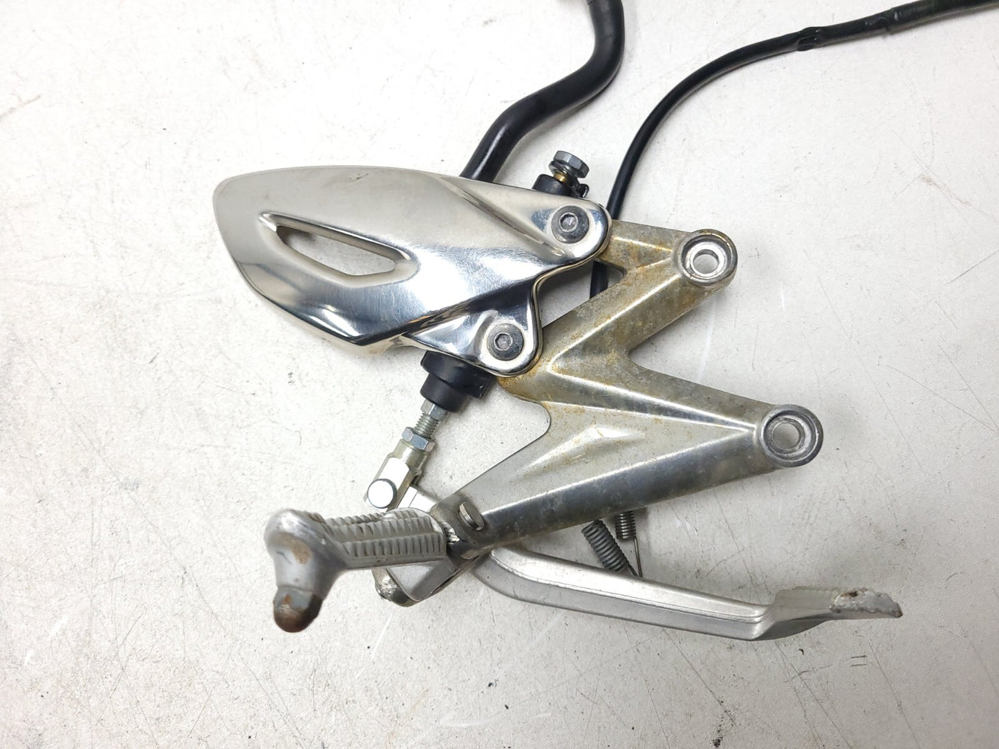 09-12 Triumph Street Triple R Front Right Foot Peg & Bracket W/master Cylinder