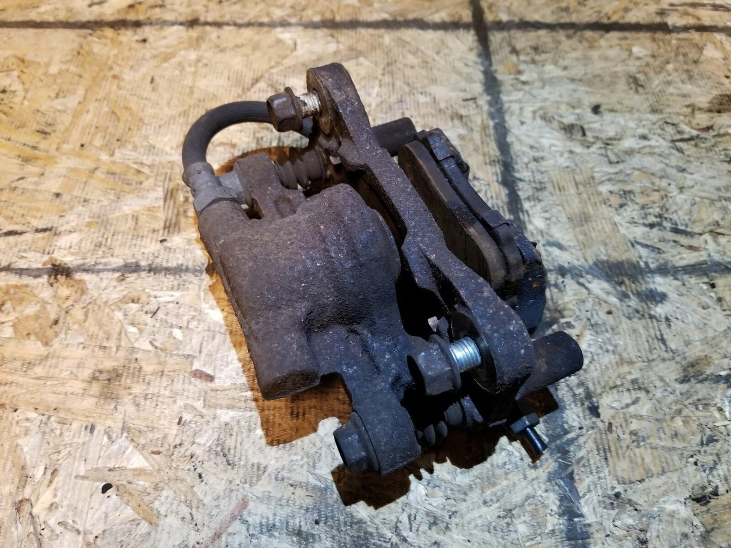 2014 Dodge Avenger Rear Brake Caliper Driver Side Left OEM