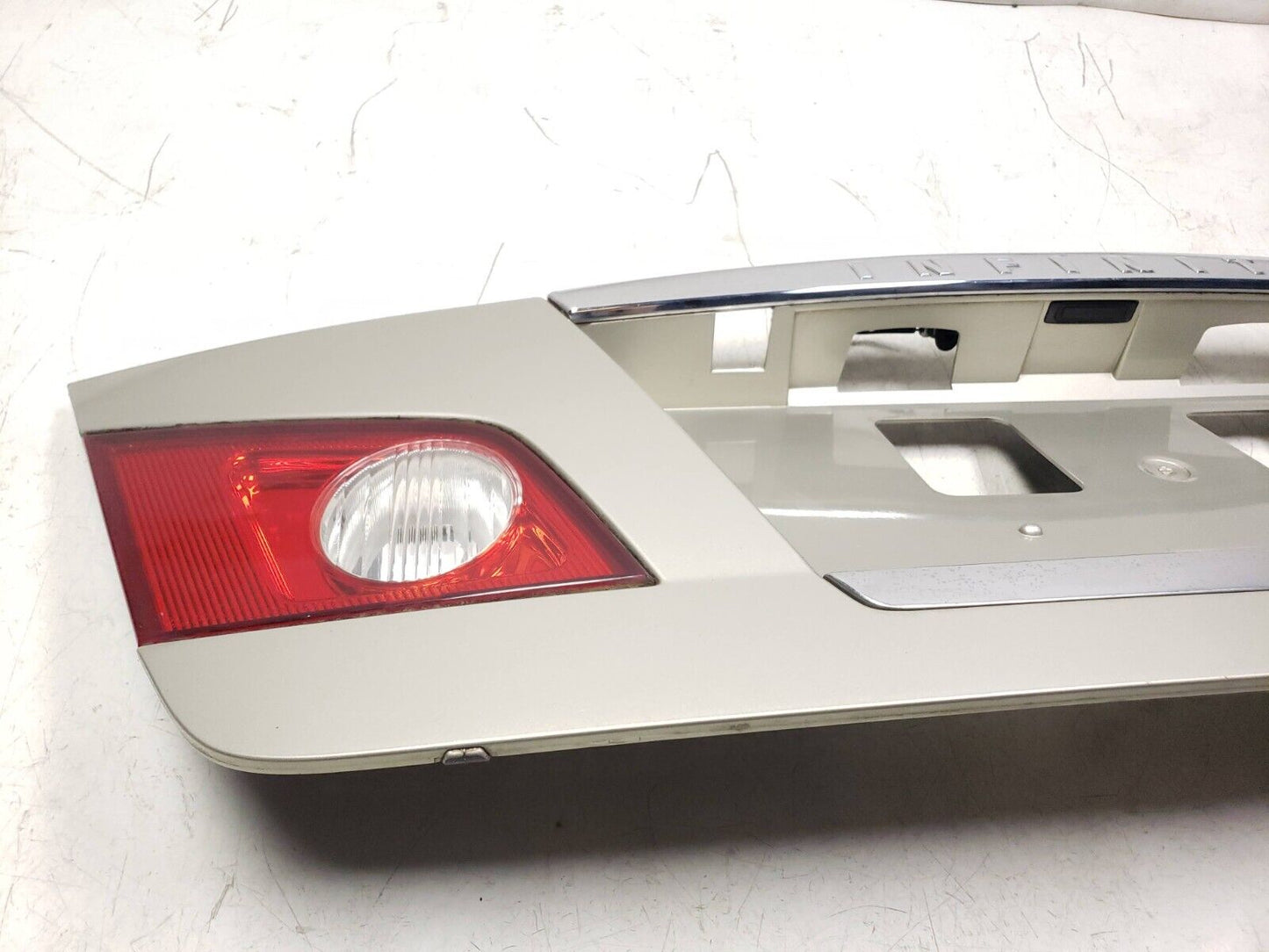 06 - 09 Infiniti M35 Trunk Trim Molding License Plate Panel OEM