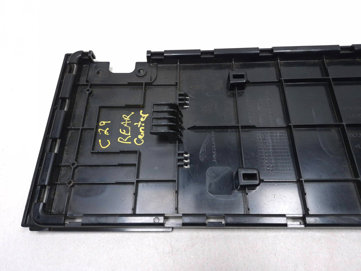 2017 Jaguar Xe Rear Seat Armrest Trim Cover Panel OEM