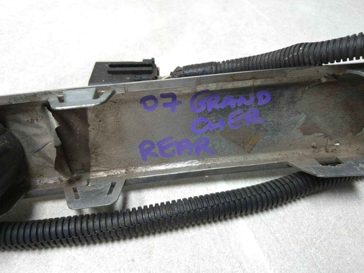 2007 Jeep Grand Cherokee Rear Bumper Cover W/ Parking Sensor Assy OEM