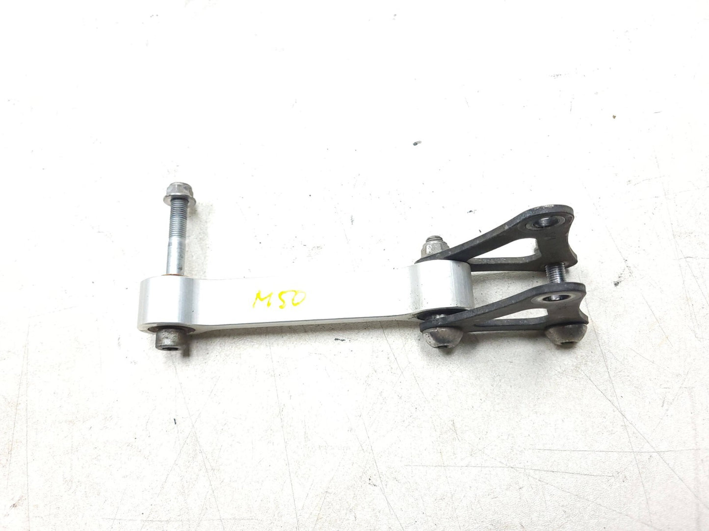 2009 - 2012 Triumph Street Triple R Rear Shock Linkage Dogbone Arm OEM