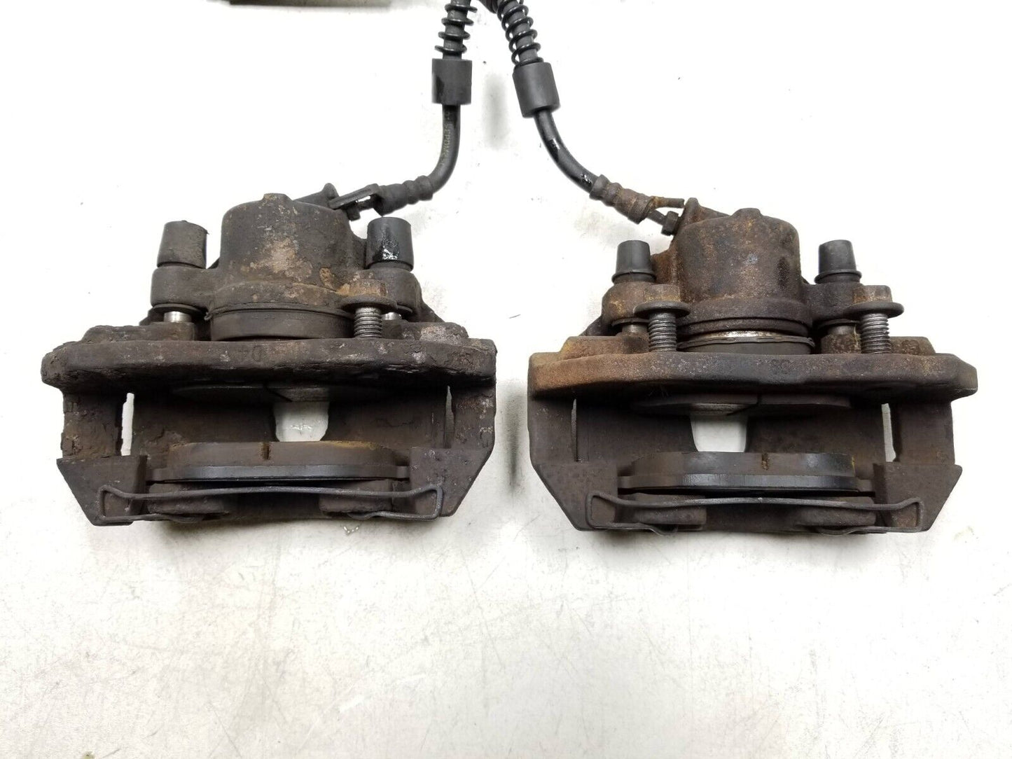 10 - 13 Ford Transit Connect Front Brake Caliper Driver & Pass Side Pair OEM
