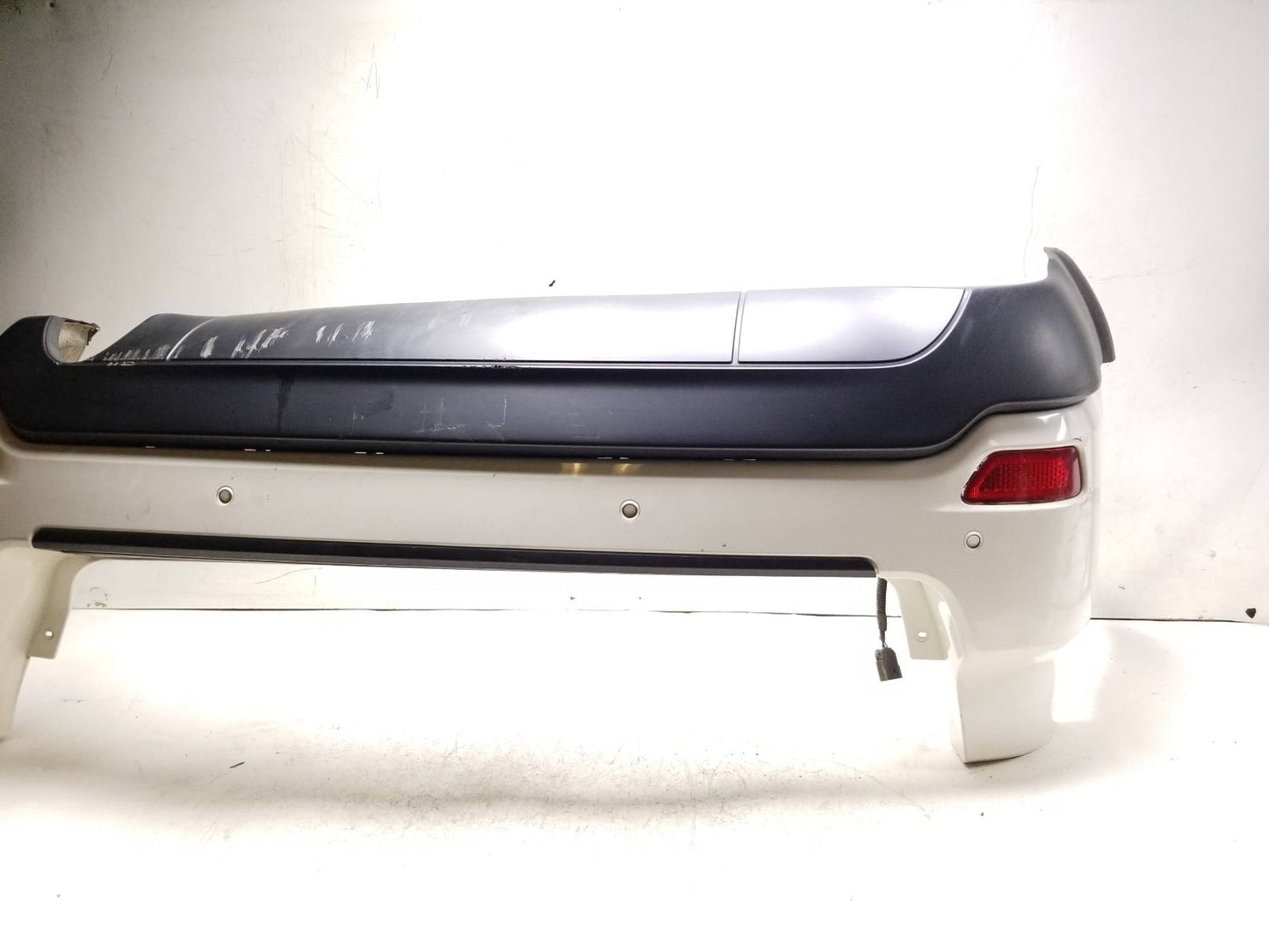 2011 - 2015 Jeep Grand Cherokee Rear Bumper Cover OEM