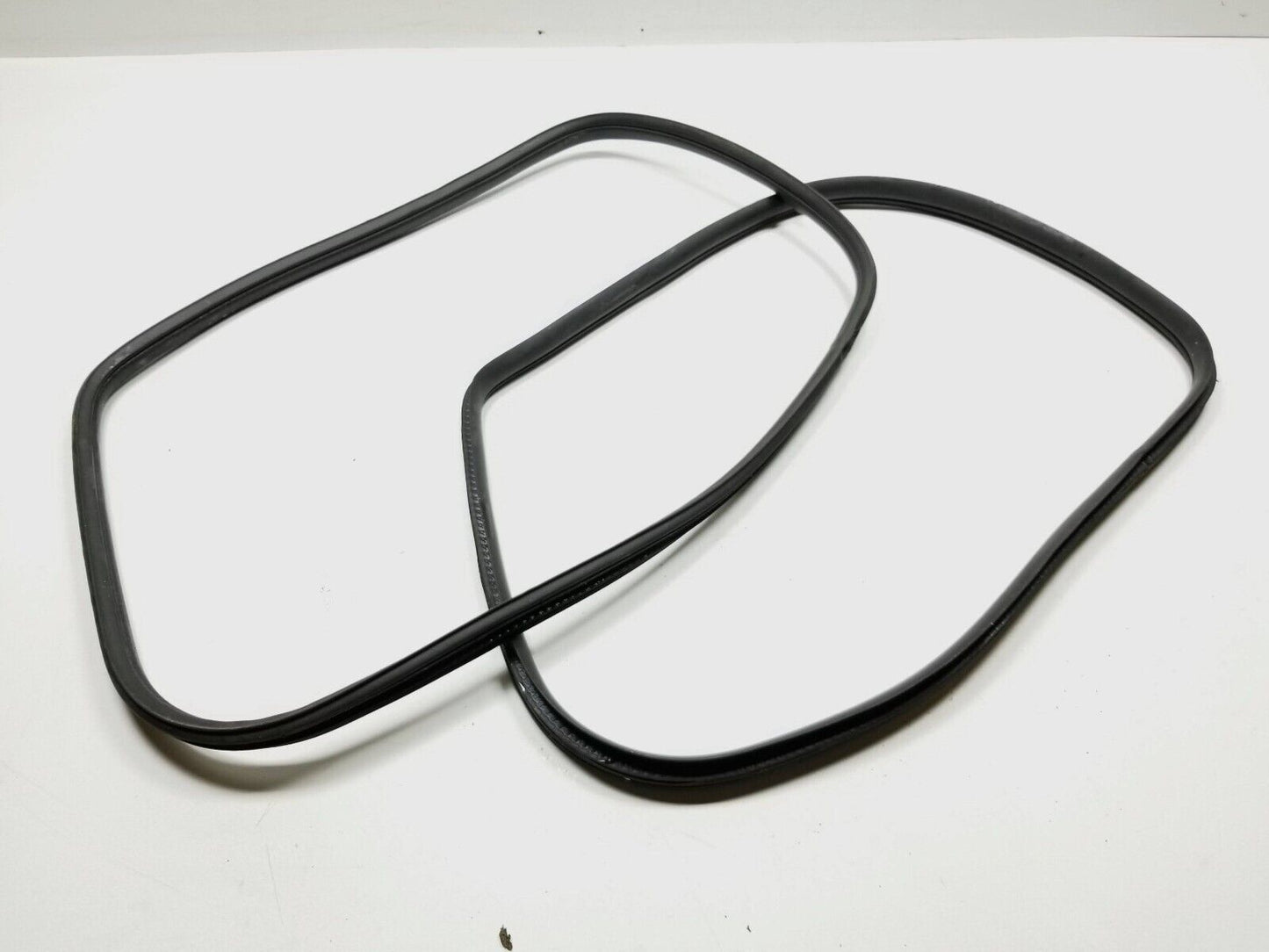 2006-2012 Nissan Armada Back Glass Weatherstrip Seal Pair OEM