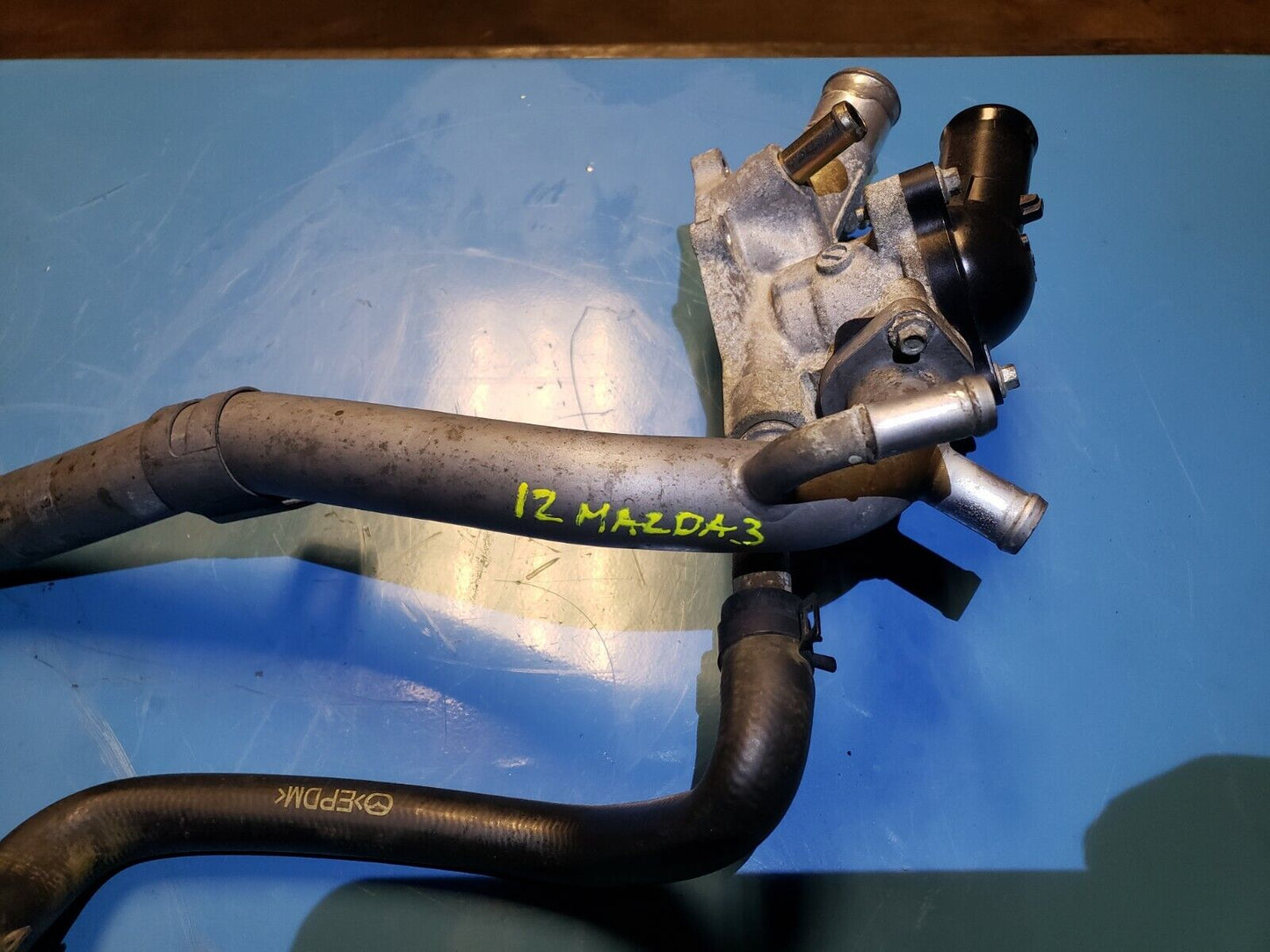 10 11 12 13 Mazda 3 2.0l Thermostat Housing OEM