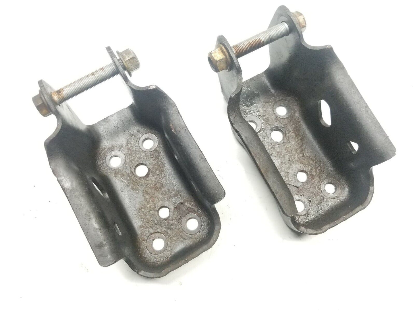 12 - 16 Dodge Grand Caravan Rear Coil Spring Hanger Bracket Pair OEM