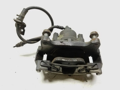 12-19 Volkswagen Passat B7 Front Brake Caliper Left Driver Side OEM